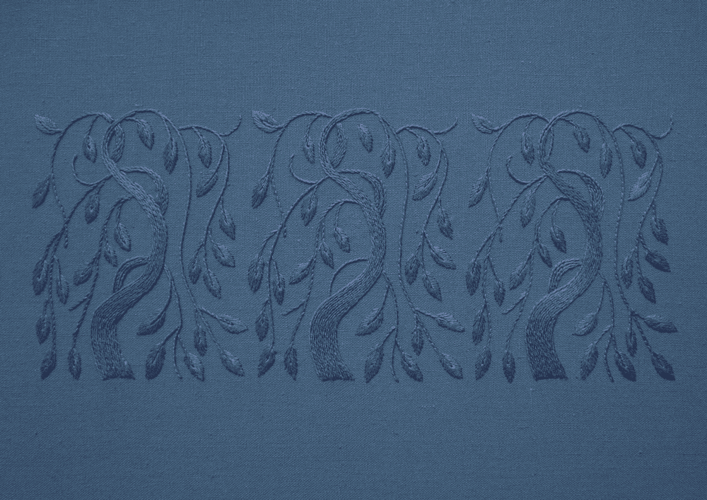 A hand-embroidered panel of three stylized weeping willow trees, stitched in periwinkle thread on a muted blue linen fabric.