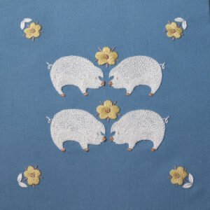 Symmetrical hand embroidery of four white pigs and yellow flowers on a blue canvas. The artwork, 'Piglet and Huahua,' shows two pairs of pigs facing each other.